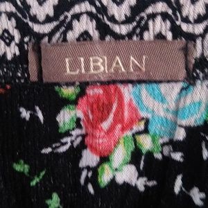 Gently used floral romper XXL by Libian.